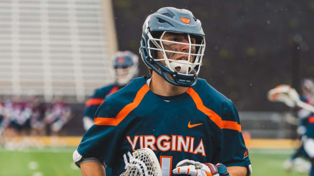 Connor Shellenberger warms up before the Virginia men's lacrosse game at Towson at Unitas Stadium.