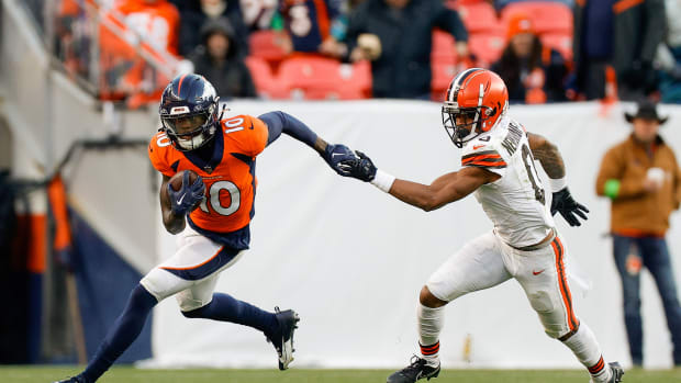 Nov 26, 2023; Denver, Colorado, USA; Denver Broncos wide receiver Jerry Jeudy (10) runs the ball against Cleveland Browns cornerback Greg Newsome II (0) in the third quarter at Empower Field at Mile High. Mandatory Credit: Isaiah J. Downing-USA TODAY Sports  