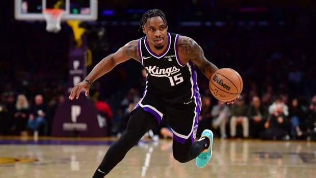 Mar 6, 2024; Los Angeles, California, USA; Sacramento Kings guard Davion Mitchell (15) controls the ball against the Los Angeles Lakers during the first half at Crypto.com Arena. Mandatory Credit: Gary A. Vasquez-USA TODAY Sports