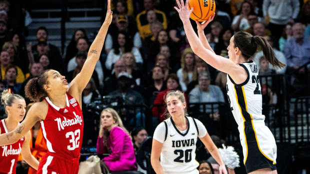 Iowa guard Caitlin Clark (22) attempts a 3-pointer during the Big Ten Tournament championship game at the Target Center on Sunday, March 10, 2024, in Minneapolis, Minn.  
