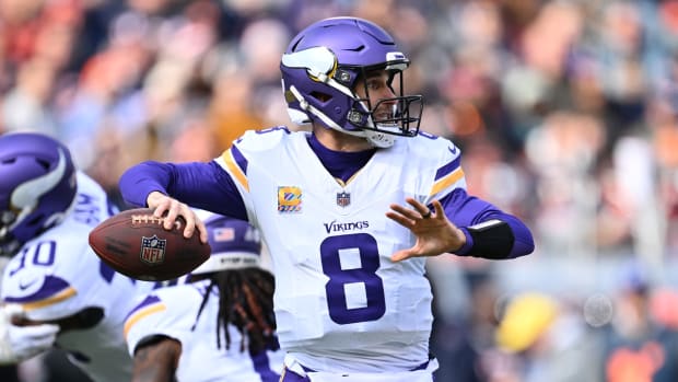 Oct 15, 2023; Chicago, Illinois, USA; Minnesota Vikings quarterback Kirk Cousins (8) passes in the first half against the Chicago Bears at Soldier Field.
