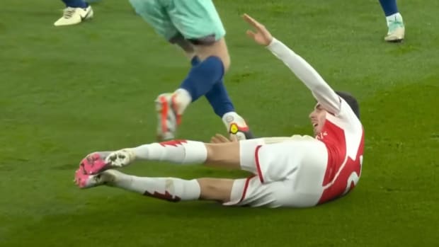 Kai Havertz pictured lying on the ground inside the penalty area after an apparent dive during Arsenal's 2-1 win over Brentford in March 2024