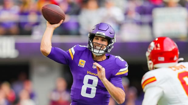 Oct 8, 2023; Minneapolis, Minnesota, USA; Minnesota Vikings quarterback Kirk Cousins (8) passes against the Kansas City Chiefs in the second quarter at U.S. Bank Stadium.