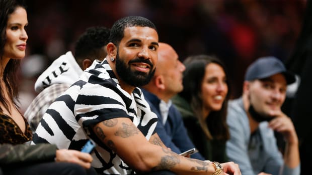 Jan 14, 2022; Miami, Florida, USA; Canadian rapper Drake attends the game between the Miami Heat and the Atlanta Hawks at FTX Arena. Mandatory Credit: Sam Navarro-USA TODAY Sports