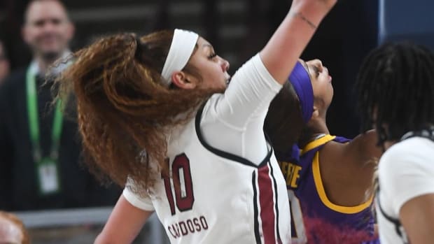 South Carolina center Kamilla Cardoso (10) defends a shot by Louisiana State University forward Angel Reese (10) during the first quarter of the SEC Women's Basketball Tournament Championship game at the Bon Secours Wellness Arena in Greenville, S.C. Sunday, March 10, 2024.
