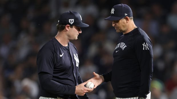 Mar 1, 2024; Tampa, Florida, USA; New York Yankees manager Aaron Boone (17) takes out starting pitcher Gerrit Cole (45) against the Toronto Blue Jays in the first inning at George M. Steinbrenner Field.