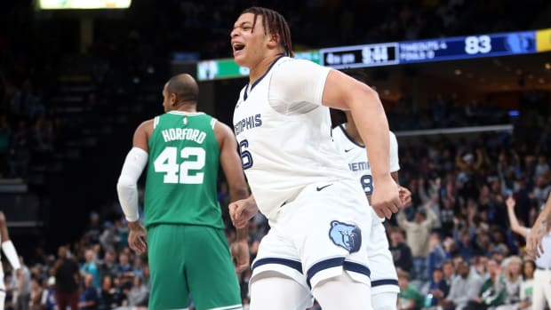 Memphis Grizzlies forward Kenneth Lofton Jr. (6) reacts after a dunk during the second half against the Boston Celtics at FedExForum.