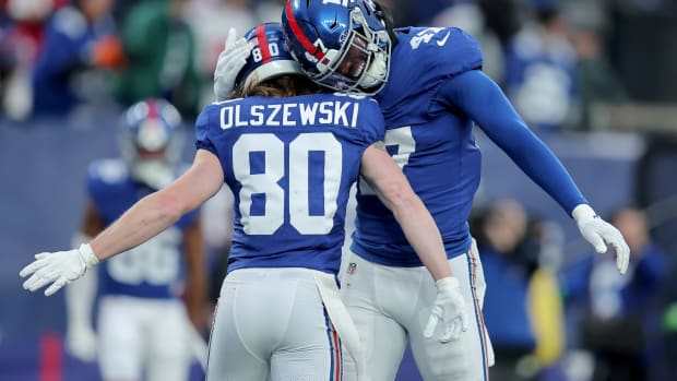 Dec 31, 2023; East Rutherford, New Jersey, USA; New York Giants wide receiver Gunner Olszewski (80) celebrates his punt return touchdown against the Los Angeles Rams with linebacker Cam Brown (47) during the fourth quarter at MetLife Stadium.