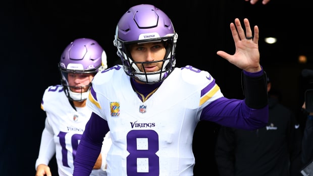 Oct 15, 2023; Chicago, Illinois, USA; Minnesota Vikings quarterback Kirk Cousins (8) takes the field before the game against the Chicago Bears at Soldier Field.
