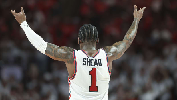 Mar 9, 2024; Houston, Texas, USA; Houston Cougars guard Jamal Shead (1) motions to the crowd during the first half against the Kansas Jayhawks at Fertitta Center. 