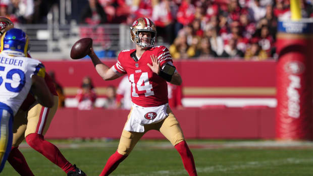 Jan 7, 2024; Santa Clara, California, USA; San Francisco 49ers quarterback Sam Darnold (14) throws a pass against the Los Angeles Rams during the first quarter at Levi's Stadium.