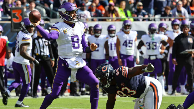 Kirk Cousins throws before Justin Jones can get there for the sack. Cousins leaving Minnesota for Atlanta takes away a possible Justin Fields destination.