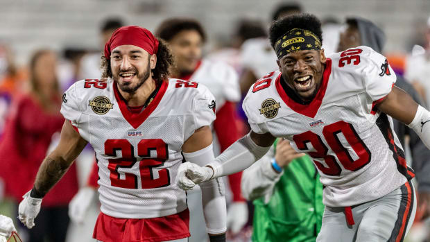 Apr 18, 2022; Birmingham, AL, USA; Tampa Bay Bandits defensive back Anthony Cioffi (22) and defensive back Quenton Meeks (30) celebrate a win over the Pittsburgh Maulers at Protective Stadium. Mandatory Credit: Vasha Hunt-USA TODAY Sports  