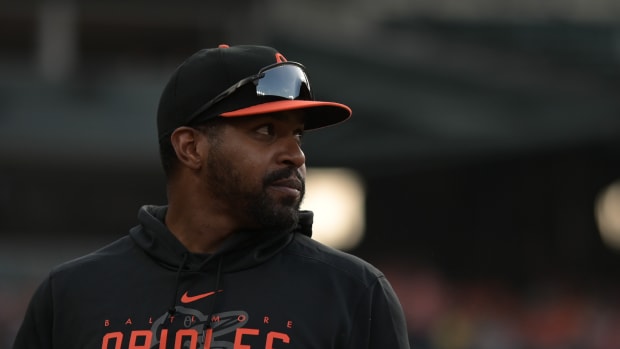 May 12, 2023; Baltimore, Maryland, USA; Baltimore Orioles pitcher Mychal Givens stands in the dugout during the game against the Pittsburgh Pirates at Oriole Park at Camden Yards. Mandatory Credit: Tommy Gilligan-USA TODAY Sports