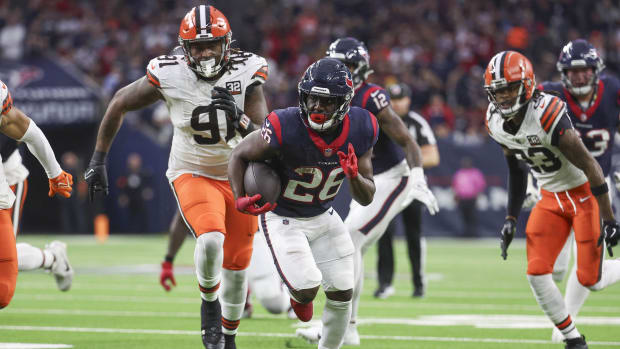 Jan 13, 2024; Houston, Texas, USA; Houston Texans running back Devin Singletary (26) in a 2024 AFC wild card game against the Cleveland Browns at NRG Stadium.