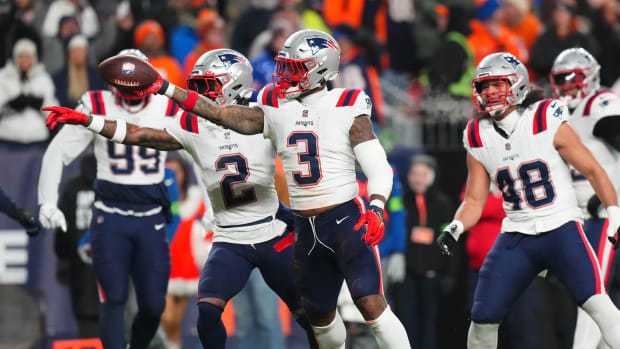 Dec 24, 2023; Denver, Colorado, USA; New England Patriots linebacker Mack Wilson Sr. (3) reacts to a defensive play in the first quarter against the Denver Broncos at Empower Field at Mile High. Mandatory Credit: Ron Chenoy-USA TODAY Sports
