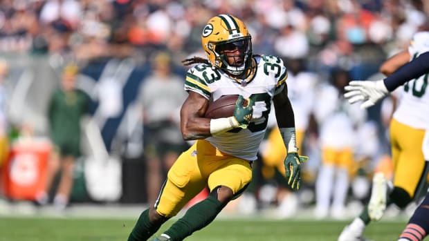 Sep 10, 2023; Chicago, Illinois, USA; Green Bay Packers running back Aaron Jones (33) runs with the ball against the Chicago Bears at Soldier Field.