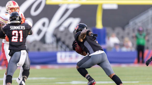 Apr 23, 2022; Birmingham, AL, USA; Houston Gamblers defensive back Will Likely (4) returns an interception for a touchdown against the Birmingham Stallions during the fist half at Protective Stadium. Mandatory Credit: Vasha Hunt-USA TODAY Sports  