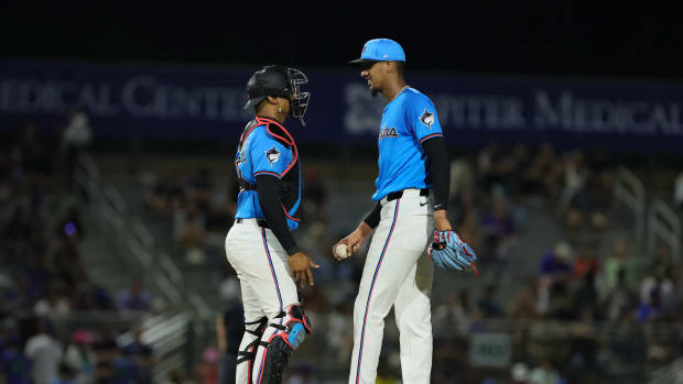 Mar 8, 2024; Jupiter, Florida, USA; Miami Marlins starting pitcher Eury Perez (39) talks to catcher Christian Bethancourt (25) against the New York Mets during the third inning at Roger Dean Chevrolet Stadium. Mandatory Credit: Sam Navarro-USA TODAY Sports  