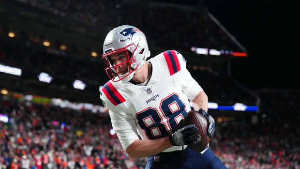 Dec 24, 2023; Denver, Colorado, USA; New England Patriots tight end Mike Gesicki (88) pulls in a touchdown reception in the third quarter against the Denver Broncos at Empower Field at Mile High. Mandatory Credit: Ron Chenoy-USA TODAY Sports