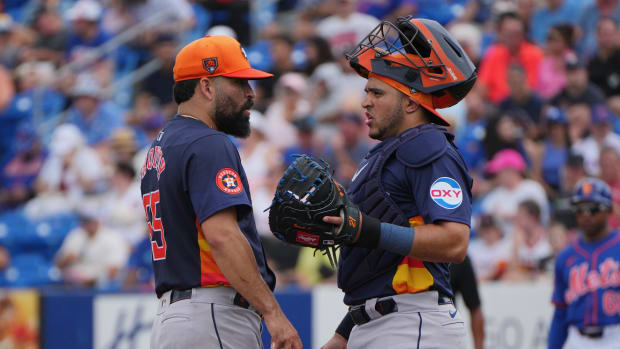 Mar 3, 2024; Port St. Lucie, Florida, USA; Houston Astros starting pitcher Jose Urquidy (65) and catcher Yainer Diaz (21) have a meeting at the mound in the second inning against the New York Mets at Clover Park. Mandatory Credit: Jim Rassol-USA TODAY Sports