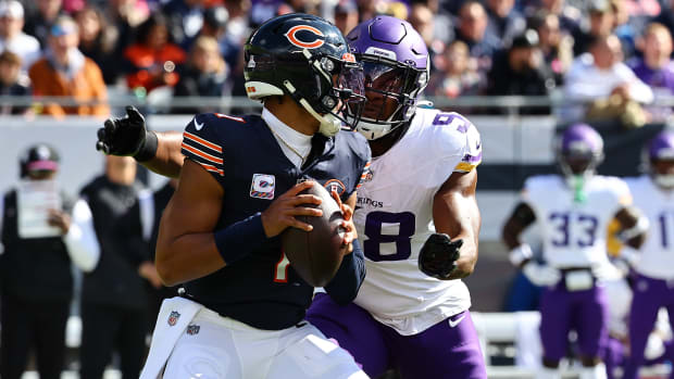 Justin Fields can't get the throw off before D.J. Wonnum arrives for a Vikings sack.