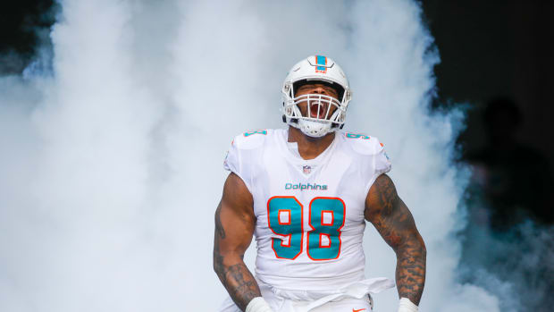 Nov 13, 2022; Miami Gardens, Florida, USA; Miami Dolphins defensive tackle Raekwon Davis (98) takes the field prior to the game against the Cleveland Browns at Hard Rock Stadium. Mandatory Credit: Sam Navarro-USA TODAY Sports