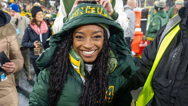 Simone Biles pictured before a game between the Packers and Chiefs at Lambeau Field.