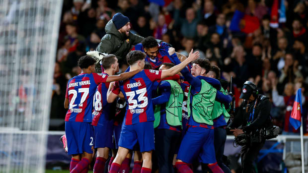 Barcelona's players pictured celebrating during their 3-1 win over Napoli in March 2024