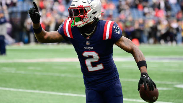 Dec 17, 2023; Foxborough, Massachusetts, USA; New England Patriots cornerback Jalen Mills (2) warms up before a game against the Kansas City Chiefs at Gillette Stadium.