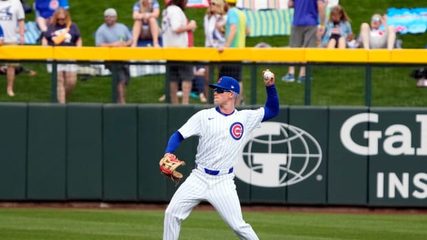 Feb 23, 2024; Mesa, Arizona, USA; Chicago Cubs center fielder Pete Crow-Armstrong (52) warms up before a agme against the Chicago White Sox at Sloan Park. Mandatory Credit: Rick Scuteri-USA TODAY Sports