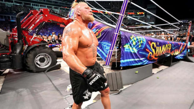 Brock Lesnar walks past the destruction he caused at the 2022 SummerSlam PLE event.