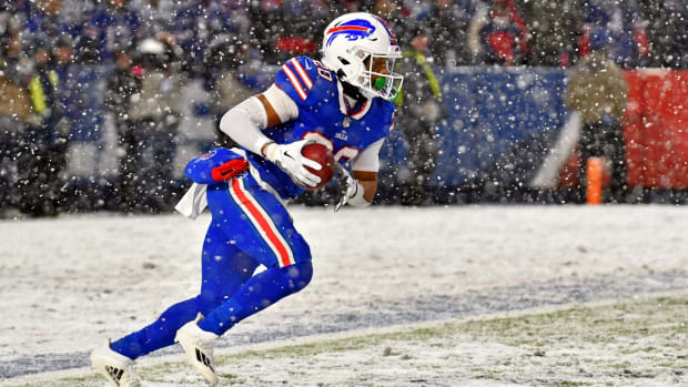Jan 22, 2023; Orchard Park, New York, USA; Buffalo Bills running back Nyheim Hines (20) runs with the ball against the Cincinnati Bengals during the third quarter of an AFC divisional round game at Highmark Stadium. Mandatory Credit: Mark Konezny-USA TODAY Sports