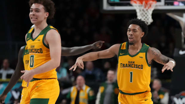 San Francisco guards Ryan Beasley and Malik Thomas during the Dons’ 89-77 loss to No. 19 Gonzaga in a West Coast tournament semifinal on March 11, 2024.