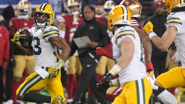 Green Bay Packers running back Aaron Jones (33) picks up 53 yards on a run during the fourth quarter of their NFC divisional playoff game against the San Francisco 49ers Saturday, Jan. 20, 2024, at Levi Stadium in Santa Clara, Calif. The 49ers beat the Packers 24-21.