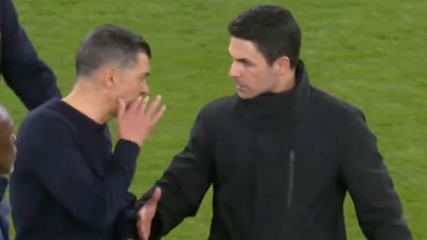 Sergio Conceicao pictured (left) refusing to shake hands with Mikel Arteta following Arsenal's penalty-shootout win over Porto in March 2024