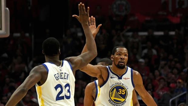 Draymond Green and Kevin Durant celebrate a play during the 2019 playoffs.