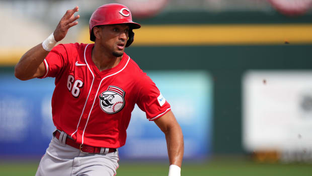 Cincinnati Reds outfielder Bubba Thompson rounds third base in the sixth inning during a MLB spring training baseball game, Saturday, Feb. 24, 2024, at Goodyear Ballpark in Goodyear, Ariz.  
