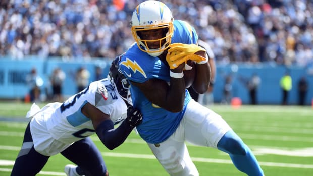 Chargers wide receiver runs with the ball in a game vs. the Tennessee Titans.