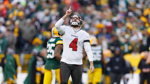 Dec 17, 2023; Green Bay, Wisconsin, USA; Tampa Bay Buccaneers kicker Chase McLaughlin (4) celebrates after kicking a field goal during the second quarter against the Green Bay Packers at Lambeau Field. Mandatory Credit: Jeff Hanisch-USA TODAY Sports  