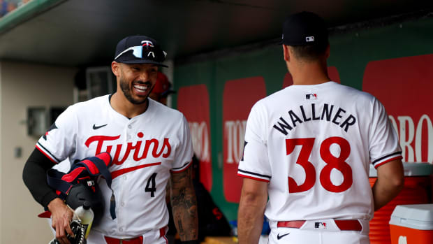 Mar 6, 2024; Fort Myers, Florida, USA; Minnesota Twins shortstop Carlos Correa (4) and starting pitcher Joe Ryan (41) get ready for a game against the Boston Red Sox at Hammond Stadium.
