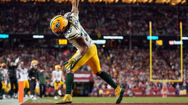 January 20, 2024; Santa Clara, CA, USA; Green Bay Packers running back Aaron Jones (33) celebrates after a two point conversion against the San Francisco 49ers during the third quarter in a 2024 NFC divisional round game at Levi's Stadium.