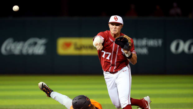 Oklahoma's Jaxon Willits (77) turns a double as Oklahoma State's Aidan Meola (2) slides into second during the college Bedlam baseball game between the University of Oklahoma Sooners and Oklahoma State University Cowboys in Norman, Okla., Tuesday, March 12, 2024.