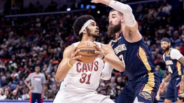 Mar 13, 2024; New Orleans, Louisiana, USA; Cleveland Cavaliers center Jarrett Allen (31) drives to the basket against New Orleans Pelicans center Jonas Valanciunas (17) during the first half at Smoothie King Center.