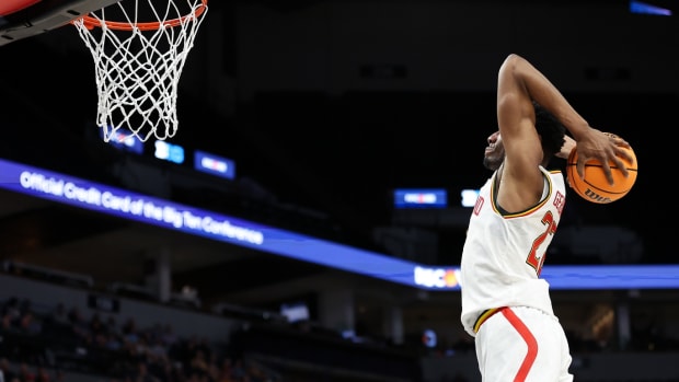 Mar 13, 2024; Minneapolis, MN, USA; Maryland Terrapins forward Jordan Geronimo (22) dunks against the Rutgers Scarlet Knights during the second half at Target Center.