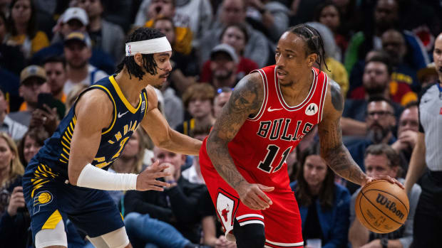 Chicago Bulls forward DeMar DeRozan (11) dribbles the ball while Indiana Pacers guard Andrew Nembhard (2) defends in the second half at Gainbridge Fieldhouse.