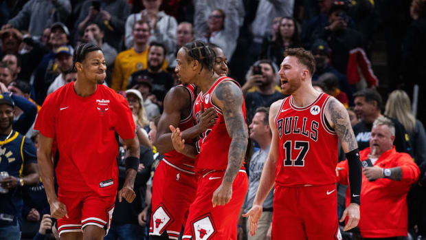 Chicago Bulls forward DeMar DeRozan (11) celebrates with his team his basket to tie the game and go to overtime against the Indiana Pacers at Gainbridge Fieldhouse.