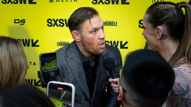 Conor McGregor speaks to press on the red carpet before the premiere of Road House at the Paramount Theatre in Austin, Texas on the first day of South by Southwest, Friday, March 8, 2024. McGregor plays the character \"Knox\" in the movie.