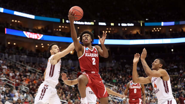 Alabama Crimson Tide guard Collin Sexton (2) drives to the basket against the Virginia Tech Hokies during the second half in the first round of the 2018 NCAA Tournament at PPG Paints Arena.
