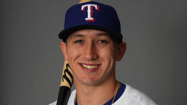 Texas Rangers outfielder Wyatt Langford hit his first grand slam in the club's Cactus League game Thursday night at Surprise Stadium. Langford is tied for MLB lead with five homers and 14 RBI this spring.